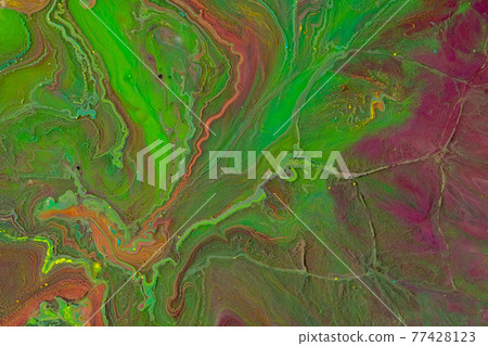 Multicolored paints create a beautiful abstract background. 77428123
