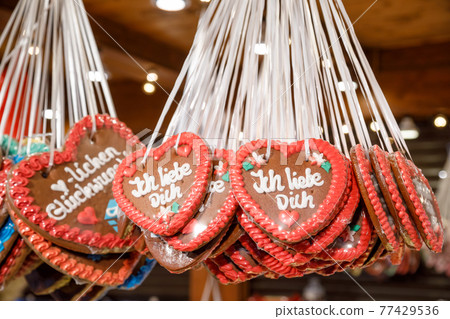 Traditional gingerbread hearts at Christmas market stall in Berlin Germany Traditional gingerbread hearts at Christmas market stall in Berlin Germany 77429536
