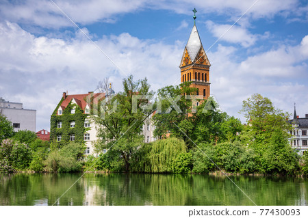 Christ Church reflecting in Isar river Landshut Old Town Bavaria Germany Christ Church reflecting in Isar river Landshut Old Town Bavaria Germany 77430093