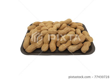 Unpeeled peanuts in a box isolated on white background 77430728