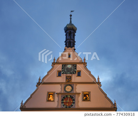 Sundial astronomical clock at tavern building facade Rothenburg ob der Tauber Old Town Bavaria Germany Sundial astronomical clock at tavern building facade Rothenburg ob der Tauber Old Town Bavaria Germany 77430918