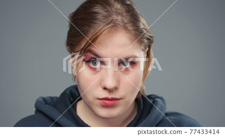 Photo of the plotting stout woman, portrait 77433414