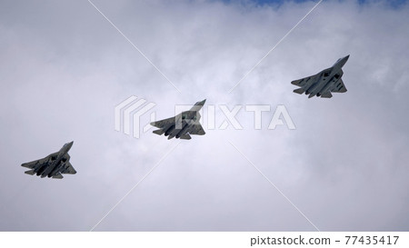 MOSCOW, RUSSIA - MAY 7, 2021: Avia parade in Moscow. Sukhoi Su-57 in the sky on parade of Victory in World War II in Moscow, Russia 77435417