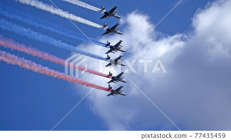MOSCOW, RUSSIA - MAY 7, 2021: Avia parade in Moscow. Group of Russian fighters Sukhoi Su-25 with painted russian flag in the sky on parade of Victory in World War II in Moscow, Russia MOSCOW, RUSSIA - MAY 7, 2021: Avia parade in Moscow. Group of Russian fighters Sukhoi Su-25 with painted russian flag in the sky on parade of Victory in World War II in Moscow, Russia 77435459