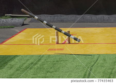 Russian national game Gorodki in which you need to knock out all the figures from the square with a wooden stick Russian national game Gorodki in which you need to knock out all the figures from the square with a wooden stick 77435463