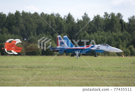 Moscow Russia Zhukovsky Airfield 31 August 2019: The Russian Knights Russkie Vityazi aerobatic team performs a demonstration flight with aerobatics figures of the international aerospace salon 77435511