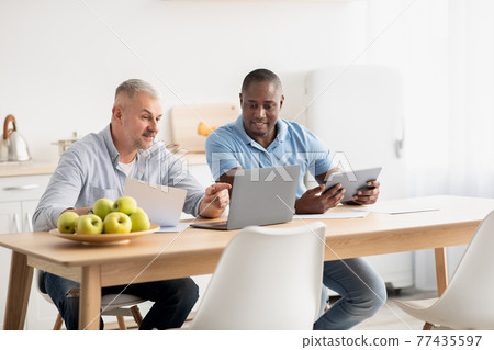Paying bills, taxes at home online during covid-19 pandemic and calculate family budget Paying bills, taxes at home online during covid-19 pandemic and calculate family budget 77435597