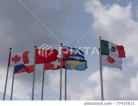 Various national flags countries under a blue sky 77435611