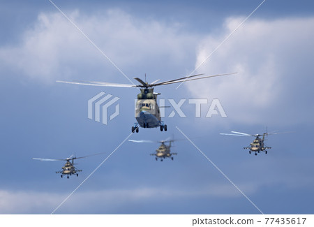 MOSCOW, RUSSIA - MAY 7, 2021: Avia parade in Moscow. Mi-26 and Mi-8AMTK helicopters fly in the sky on parade of Victory in World War II in Moscow, Russia MOSCOW, RUSSIA - MAY 7, 2021: Avia parade in Moscow. Mi-26 and Mi-8AMTK helicopters fly in the sky on parade of Victory in World War II in Moscow, Russia 77435617