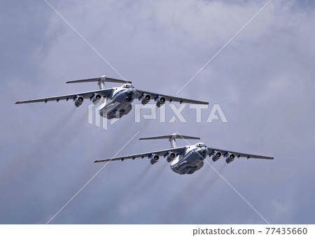 MOSCOW, RUSSIA - MAY 7, 2021: Avia parade in Moscow. Ilyushin Il-76 multi-purpose four-engined strategic airlifters fly in the sky on parade of Victory in World War II in Moscow, Russia 77435660