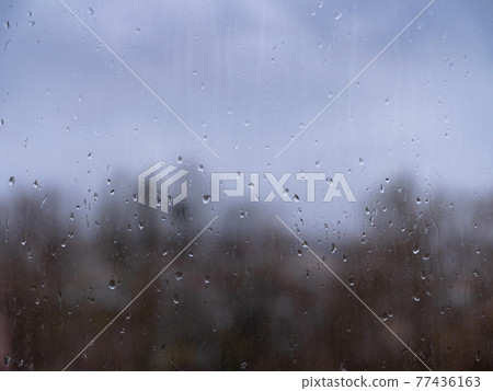 raindrops on window glass, autumn season raindrops on window glass, autumn season 77436163