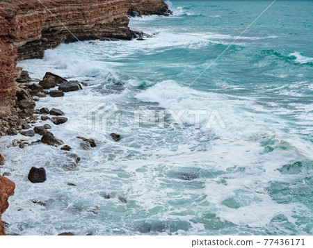 view of ocean waves and a fantastic rocky shore view of ocean waves and a fantastic rocky shore 77436171