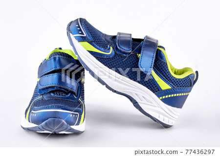 Blue and green sport trainers. 77436297