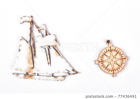 Cardboard ship and compass. Cardboard ship and compass. 77436491
