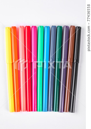 Colorful markers on white background. Colorful markers on white background. 77436558