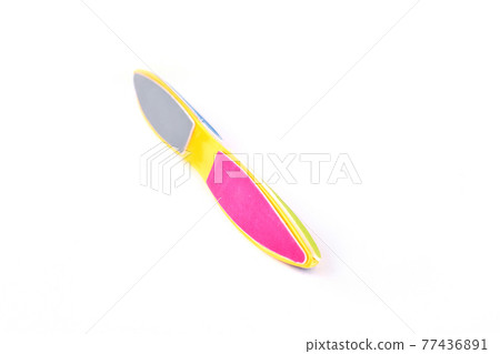 Colorful nail file, white background. Colorful nail file, white background. 77436891