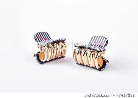 Beautiful hair clips on white background. Beautiful hair clips on white background. 77437051