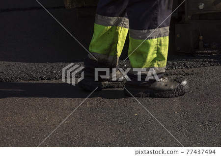 Worker carrying out maintenance streets, Madrid, Spain. 77437494