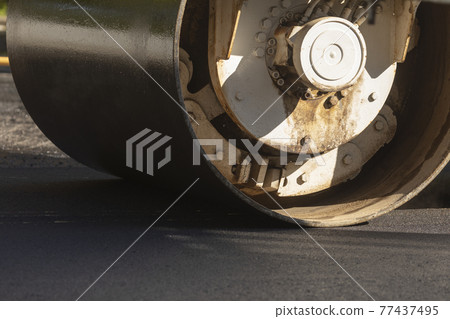 Maintenance and paving of streets in Madrid, Spain. 77437495