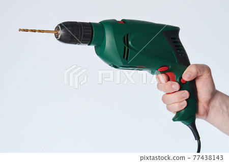 Hand hold green drill Hand hold green drill 77438143