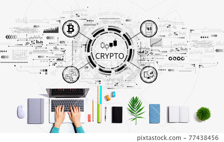 Crypto Trading theme with person using a laptop 77438456