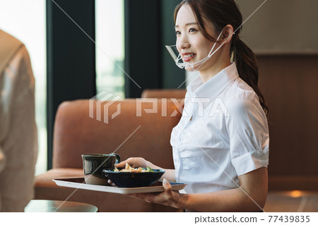 Work scene of restaurant staff with mouse shield Work scene of restaurant staff with mouse shield 77439835