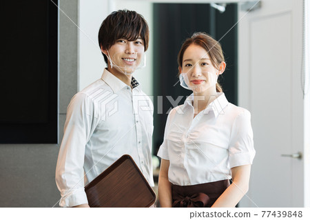 Portrait of restaurant staff with mouth shield Portrait of restaurant staff with mouth shield 77439848
