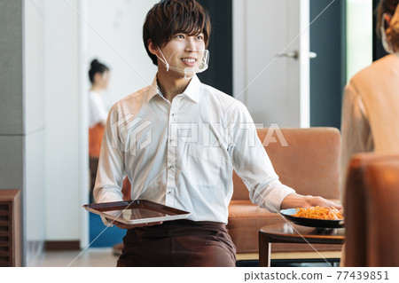 Work scene of restaurant staff with mouse shield Work scene of restaurant staff with mouse shield 77439851