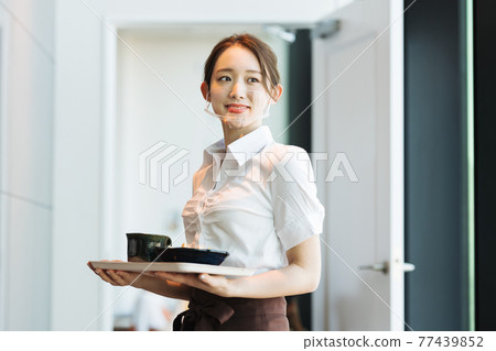 Portrait of restaurant staff with mouth shield Portrait of restaurant staff with mouth shield 77439852