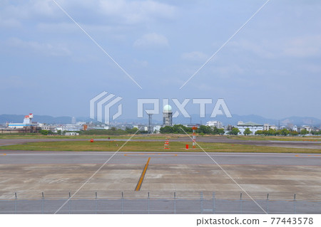 Air Self-Defense Force Komaki base seen from prefectural Nagoya Airport 77443578
