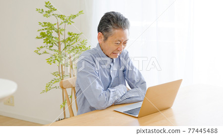 Senior men, computers, worries, thinking Senior men, computers, worries, thinking 77445488