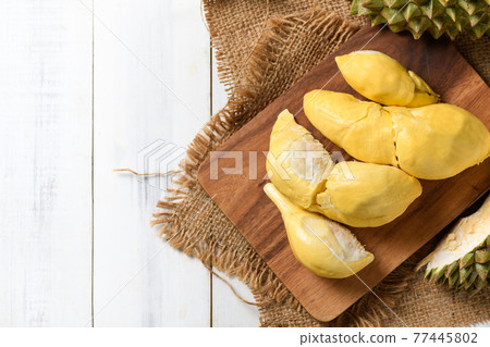 top view of Chani Kai Durian or Durio zibthinus murray on wood plate, top view of Chani Kai Durian or Durio zibthinus murray on wood plate, 77445802