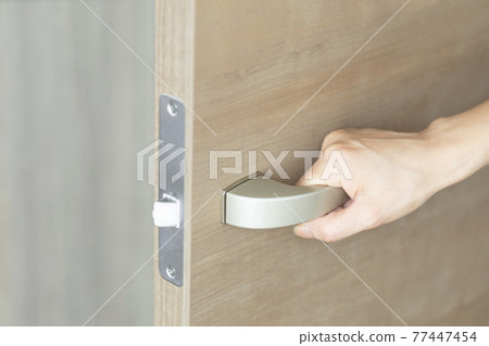 Photo material of an image of opening and closing a door Photo material of an image of opening and closing a door 77447454