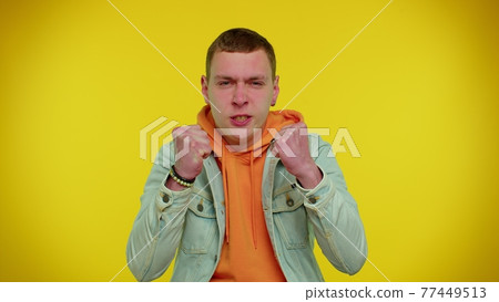 Upset frustrated annoyed irritated man quarreling, asking reason of conflict, why such stubborn 77449513