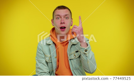 Inspired stylish man make Eureka gesture came up with creative plan feels excited with good idea 77449525