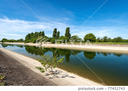 Reinforced Concrete Irrigation Canal in the Padan Plain - Lombardy Italy Reinforced Concrete Irrigation Canal in the Padan Plain - Lombardy Italy 77452743