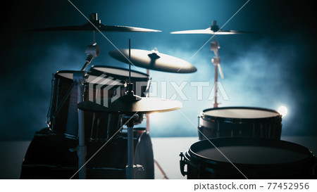 Drum kit against the light. Drum set equipment in studio no people. Drum kit against the light. Drum set equipment in studio no people. 77452956