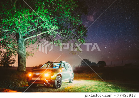 Milky Way Galaxy In Night Starry Sky Above Tree In Summer Forest. Glowing Stars Above Landscape. View From Europe 77453918
