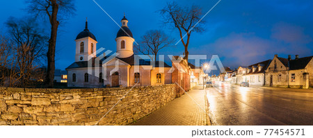 Kuressaare, Estonia. Church Of St. Nicholas In Blue Hour Evening Night. Street. Panorama, panoramic view Kuressaare, Estonia. Church Of St. Nicholas In Blue Hour Evening Night. Street. Panorama, panoramic view 77454571