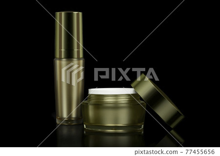 Mockup empty luxury golden cream jar for skincare and beauty skin is uncover and empty luxury golden container cream pump bottle, isolated on black background with clipping path. 77455656