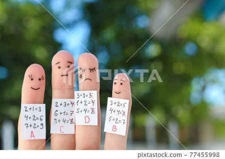 Fingers art of people. Concept students in medical mask from COVID-2019. Fingers art of people. Concept students in medical mask from COVID-2019. 77455998