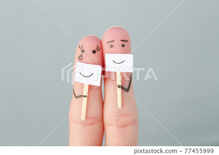Fingers art of couple. Concept of people hiding emotions. 77455999