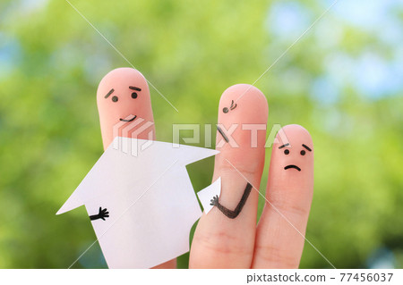 Fingers art of family during quarrel. Concept of man and woman divide house after divorce. 77456037