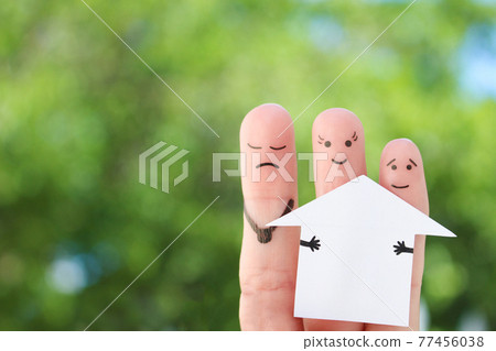 Fingers art of family during quarrel. Concept of man and woman divide house after divorce. 77456038