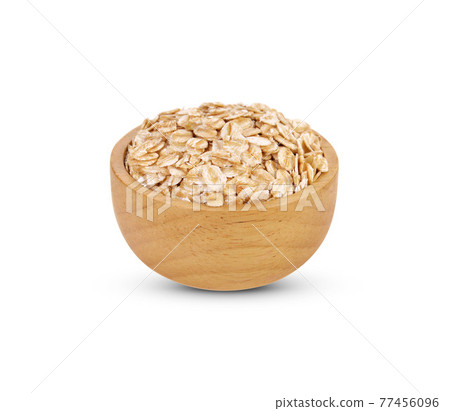 oat flakes isolated on white background. oat flakes isolated on white background. 77456096