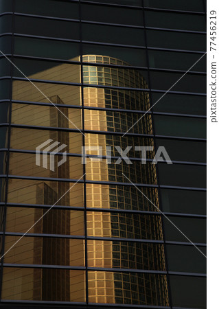 Sumida Ward Office reflected in the Asahi Beer Headquarters Building in River Pier Azumabashi, Tokyo Sumida Ward Office reflected in the Asahi Beer Headquarters Building in River Pier Azumabashi, Tokyo 77456219