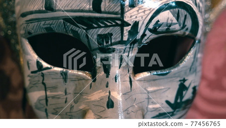 Mysterious black and white Venetian mask 77456765