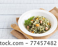 Pilaf with carrot leaves to boost immunity 77457482