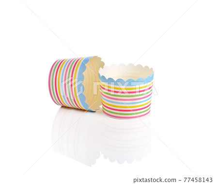 Colorful cupcake paper cups on white background 77458143