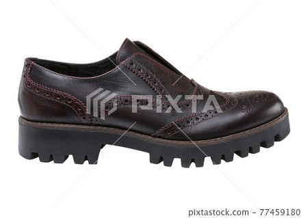 brown fashionable men's leather shoe with a thick sole with protectors, located horizontally, on a white background brown fashionable men's leather shoe with a thick sole with protectors, located horizontally, on a white background 77459180